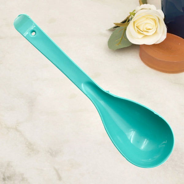 Plastic serving spoon.