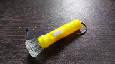 8758_mini_plastic_torch_light_1pc